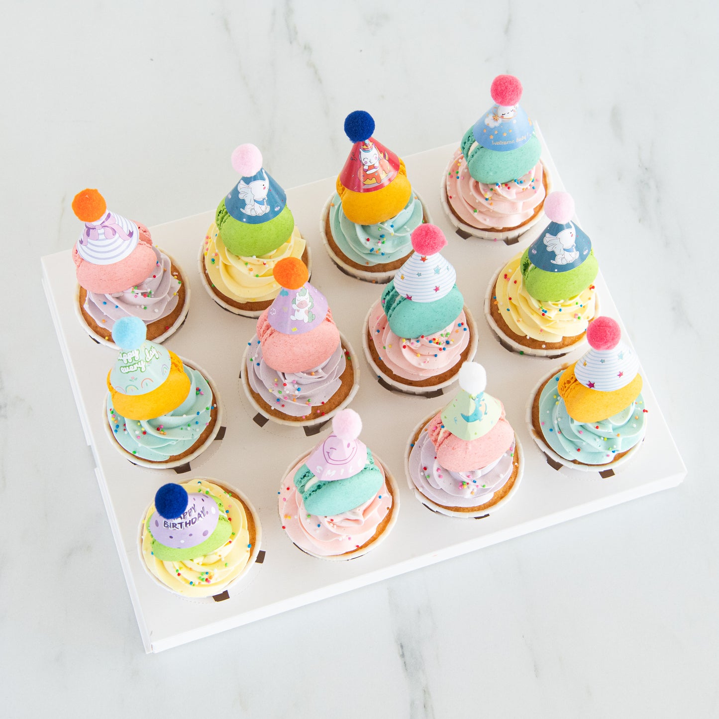 Limited Edition Macaron Cupcake with party hat | (U.P $128.80)