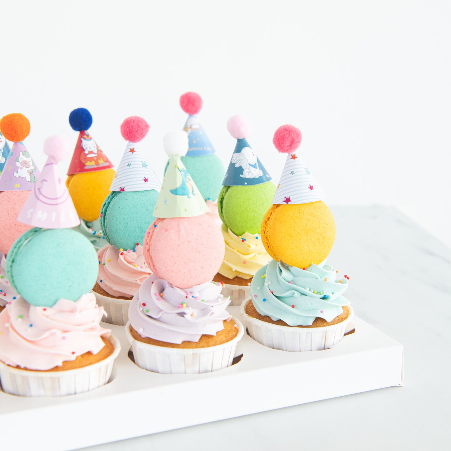 Limited Edition Macaron Cupcake with party hat | (U.P $128.80)